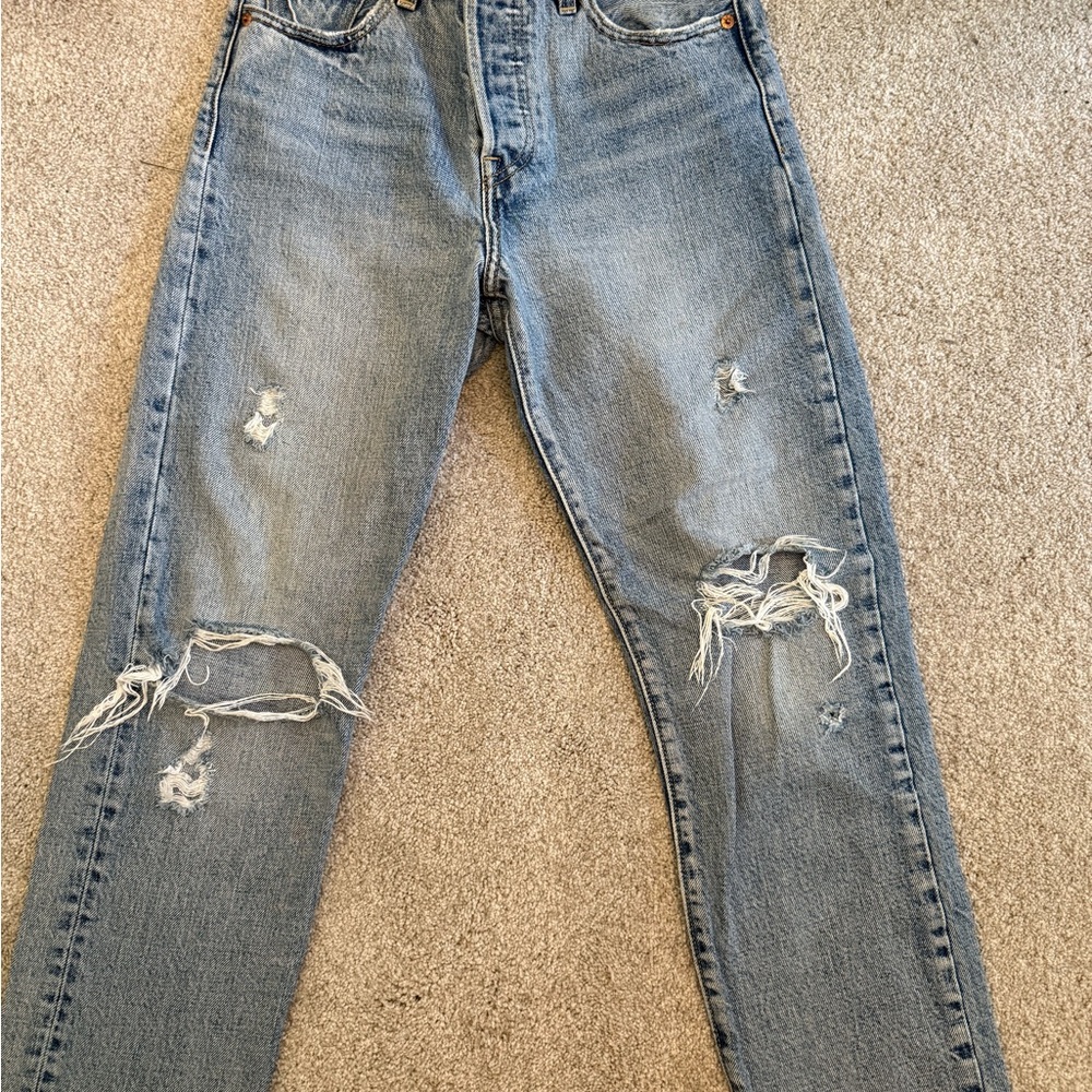Distressed Blue Jeans